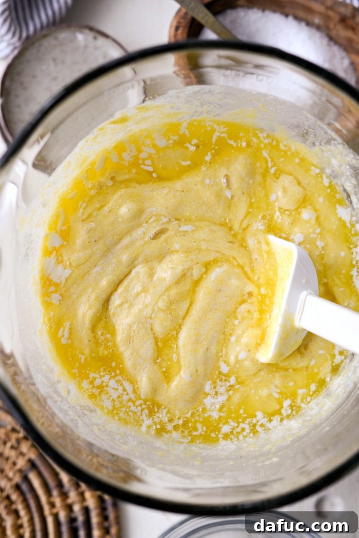 Classic Golden Cornbread 9 Cornbread batter being gently mixed.
