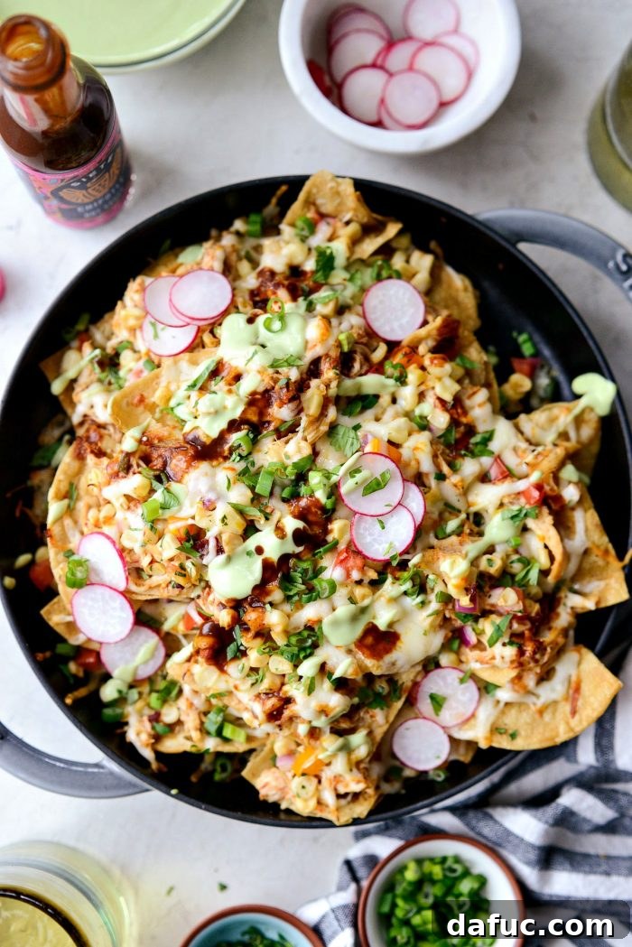 Golden Lava Chicken Nachos 10 Freshly baked Jacuzzi Chicken Nachos, hot from the oven with perfectly melted Muenster cheese, garnished with vibrant green onions and cilantro.