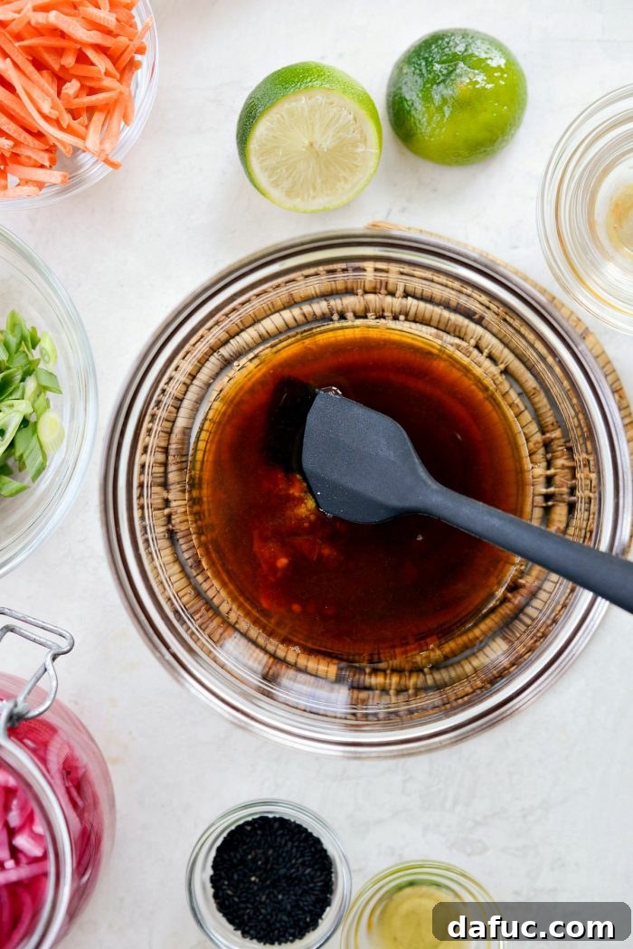 Zesty Ponzu Chicken Rice Bowls 6 Top-down shot of the ponzu marinade/sauce being mixed in a bowl.