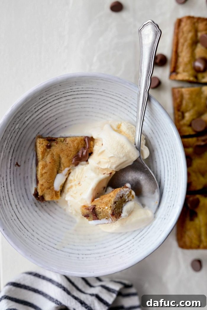 Golden Brown Butter Chocolate Chip Blondies 21 An overhead shot of two perfectly baked and cooled Brown Butter Chocolate Chip Blondies.