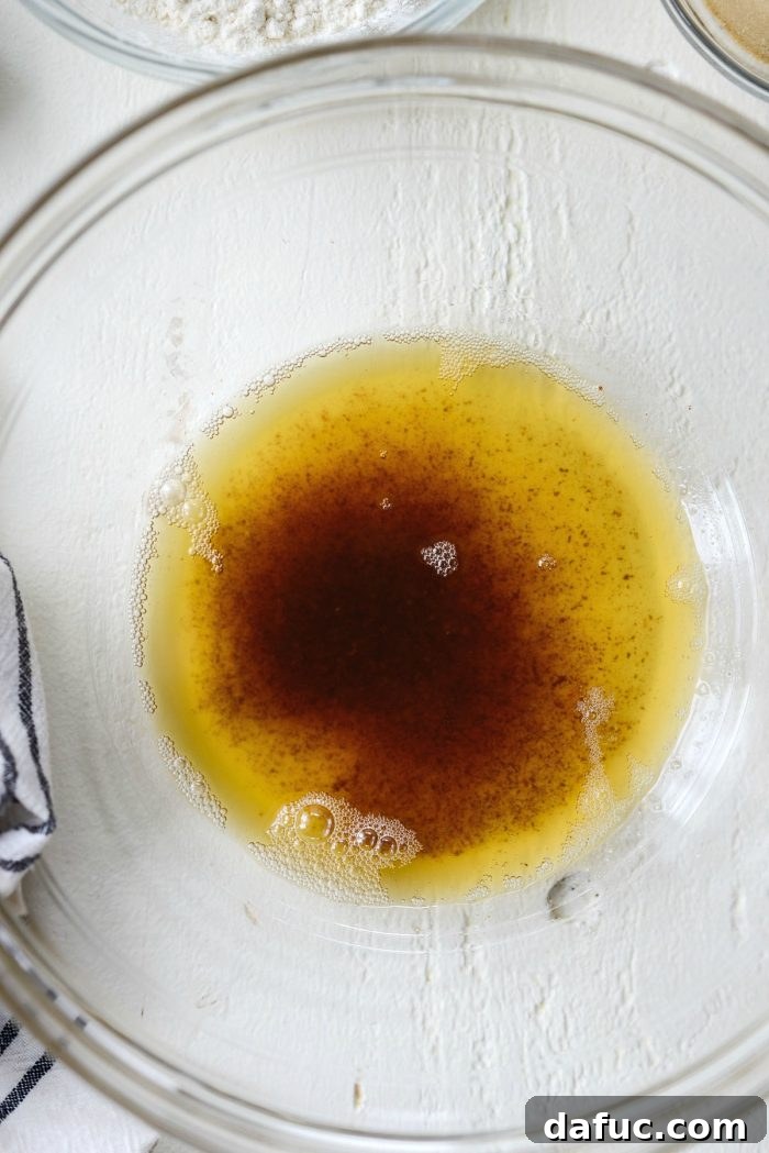 Butter melting in a skillet, beginning to brown.