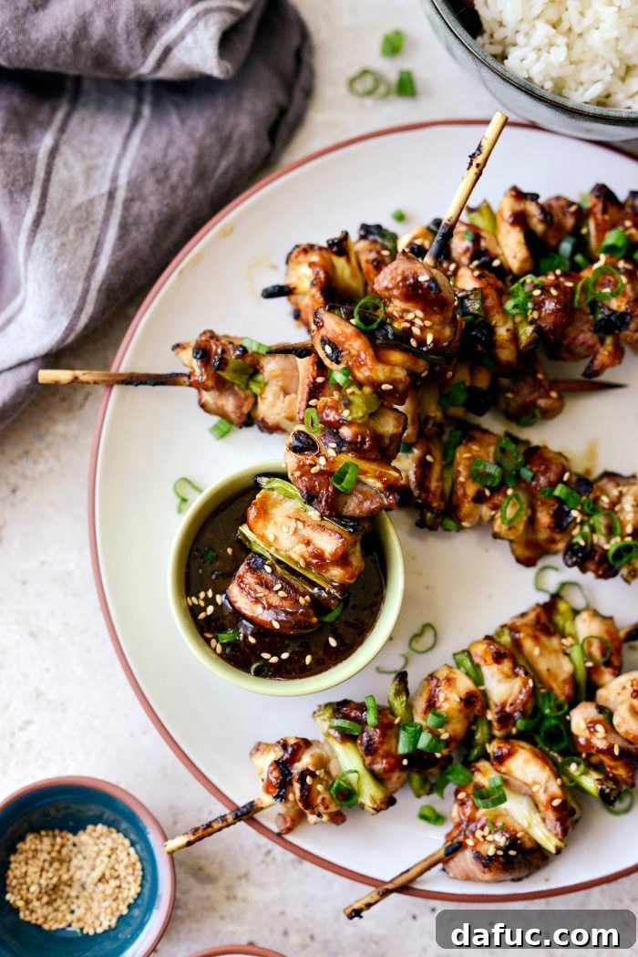 Final close-up of a Chicken Yakitori skewer with caramelized sauce, ready to eat.