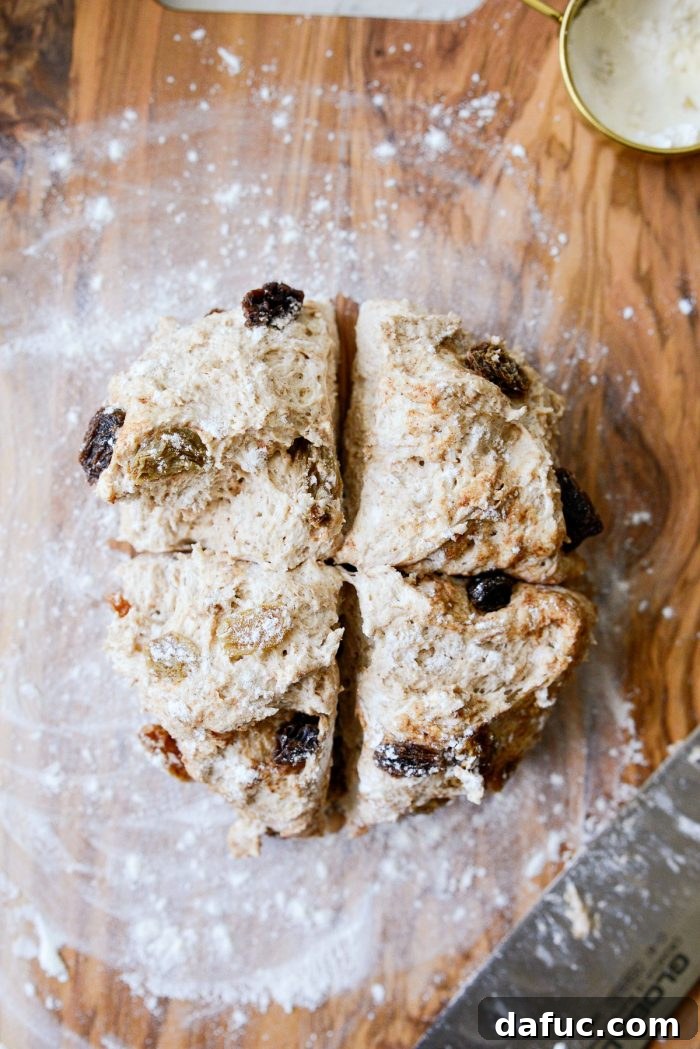 Homemade Air Fryer Cinnamon Raisin Bagels 16 dough divided into fourths.