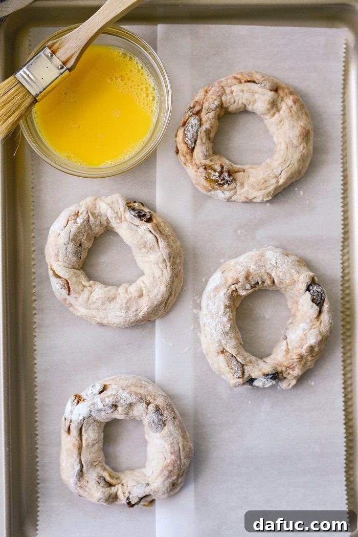 Homemade Air Fryer Cinnamon Raisin Bagels 20 repeat with the remaining pieces of dough.