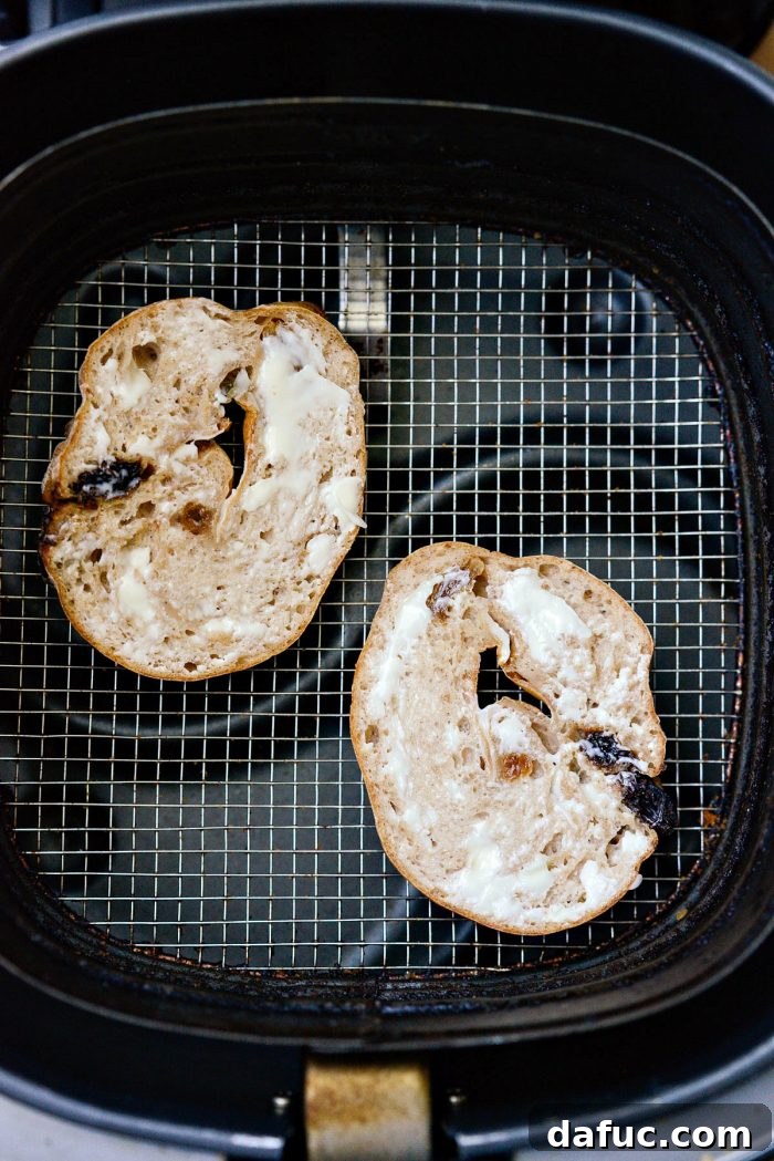 Homemade Air Fryer Cinnamon Raisin Bagels 27 cut bagels slathered in butter get toasted in air fryer
