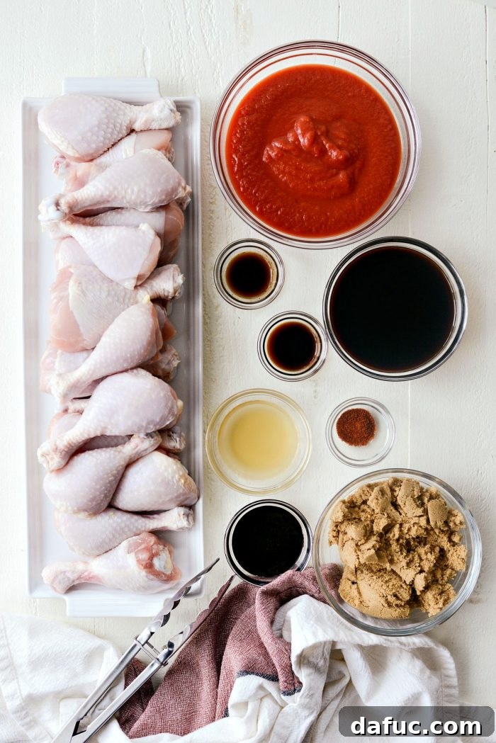 Sticky Sweet BBQ Drumsticks 4 All the ingredients for the quick barbecue sauce laid out, including tomato puree, dark brown sugar, soy sauce, apple cider vinegar, molasses, liquid smoke, Worcestershire sauce, and chili powder.