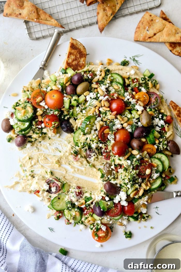 Final close-up of the appetizing 7-Layer Loaded Hummus Dip