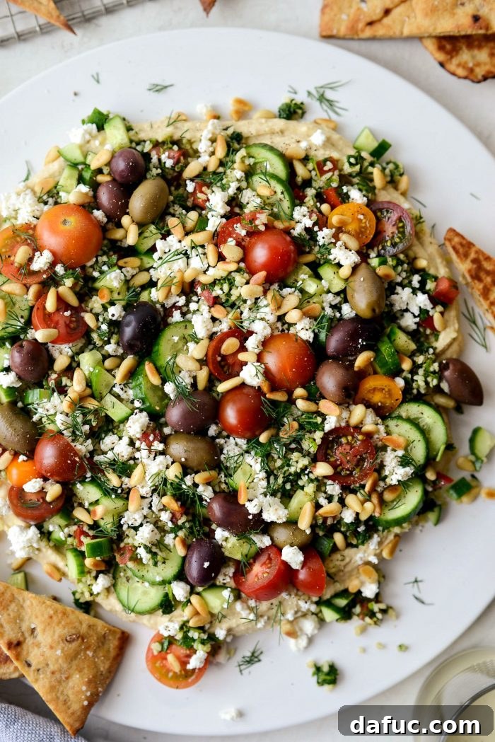 Beautifully presented 7-Layer Loaded Hummus Dip