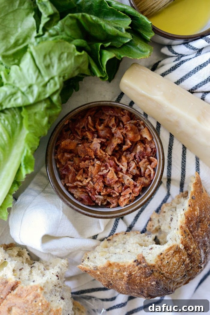 Crumbled crispy bacon in a white bowl, ready for topping