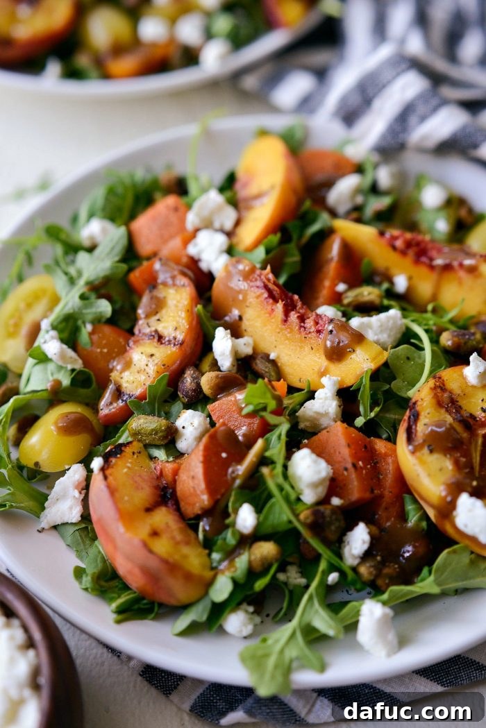 Final plated Grilled Peach Sweet Potato Arugula Salad, ready for sharing