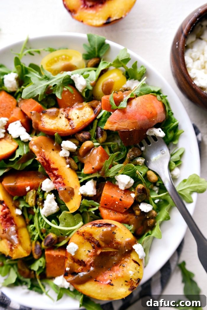 Sweet and Savory Peach Sweet Potato Arugula Salad 12 Final plated Grilled Peach and Sweet Potato Arugula Salad, garnished and ready