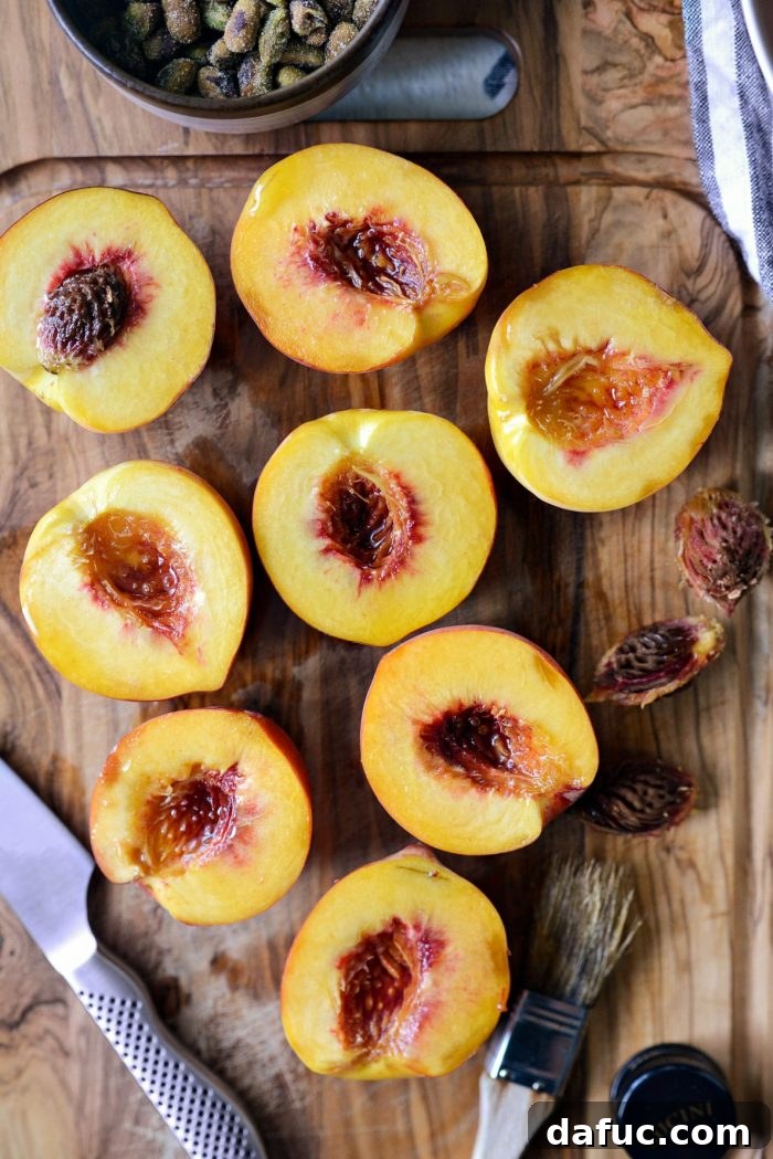 Sweet and Savory Peach Sweet Potato Arugula Salad 6 Peach halves brushed with olive oil, ready for grilling