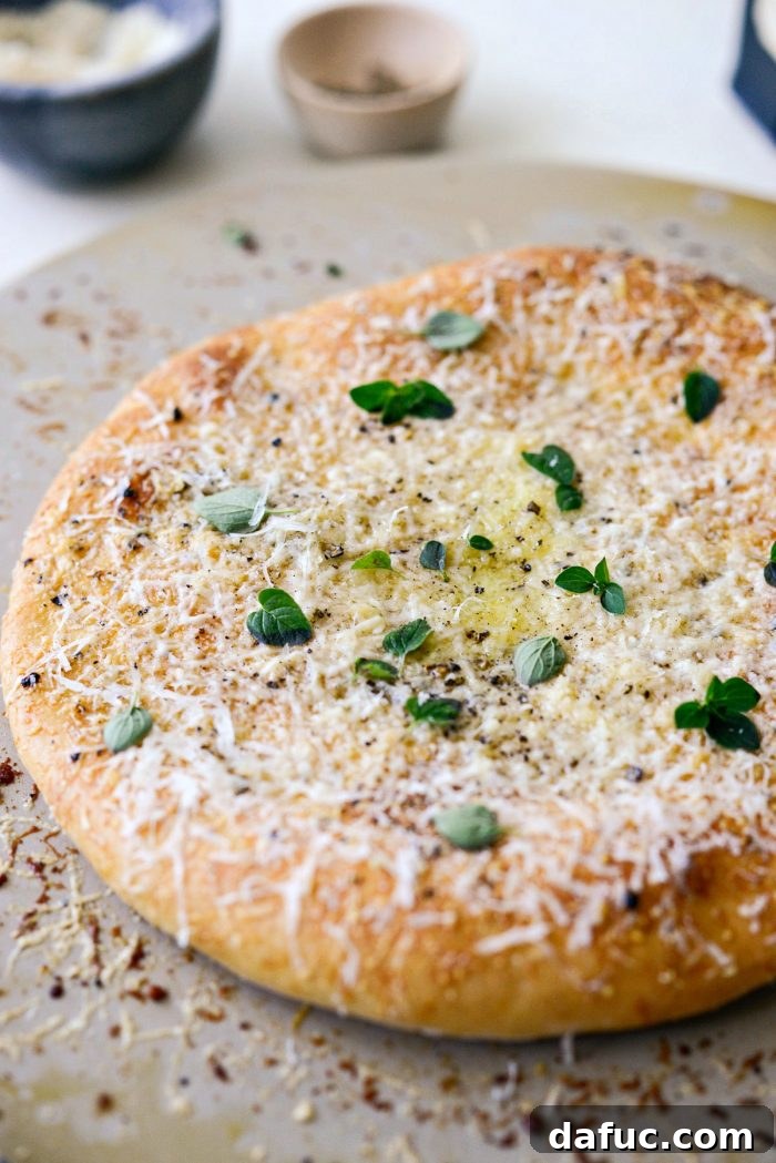 Roman Cheese and Pepper Pizza 14 Close-up of the crispy crust and melted cheese on Cacio e Pepe pizza