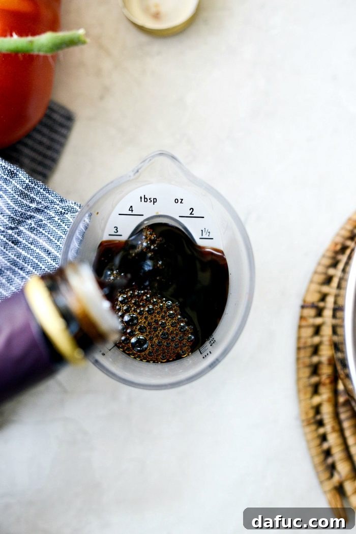Measuring balsamic vinegar in a liquid measuring cup