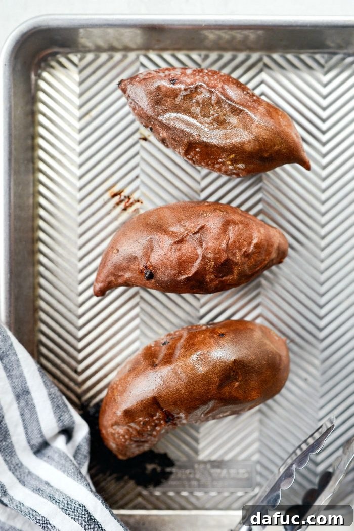 Caramelized Whole Sweet Potatoes 5 Roasted sweet potatoes with golden-brown skin
