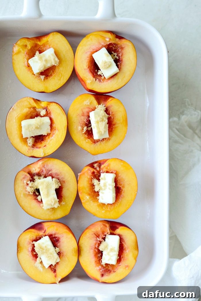 nectarine halves with butter and brown sugar in white dish