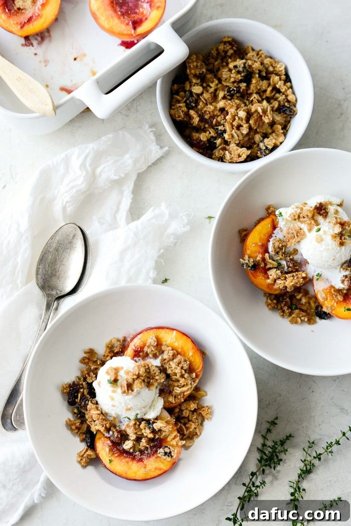 Dishing out Baked Nectarines with Oatmeal Cookie Crumble into white bowls