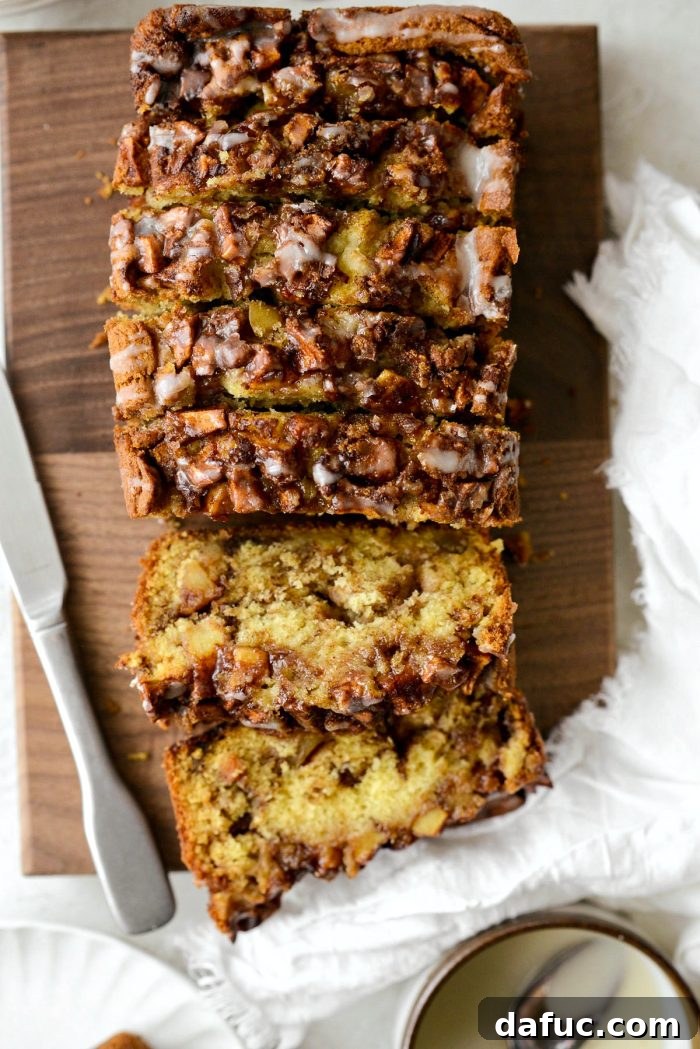 Cinnamon Apple Fritter Bread 22 A perfectly sliced piece of Dutch Apple Fritter Bread with glaze