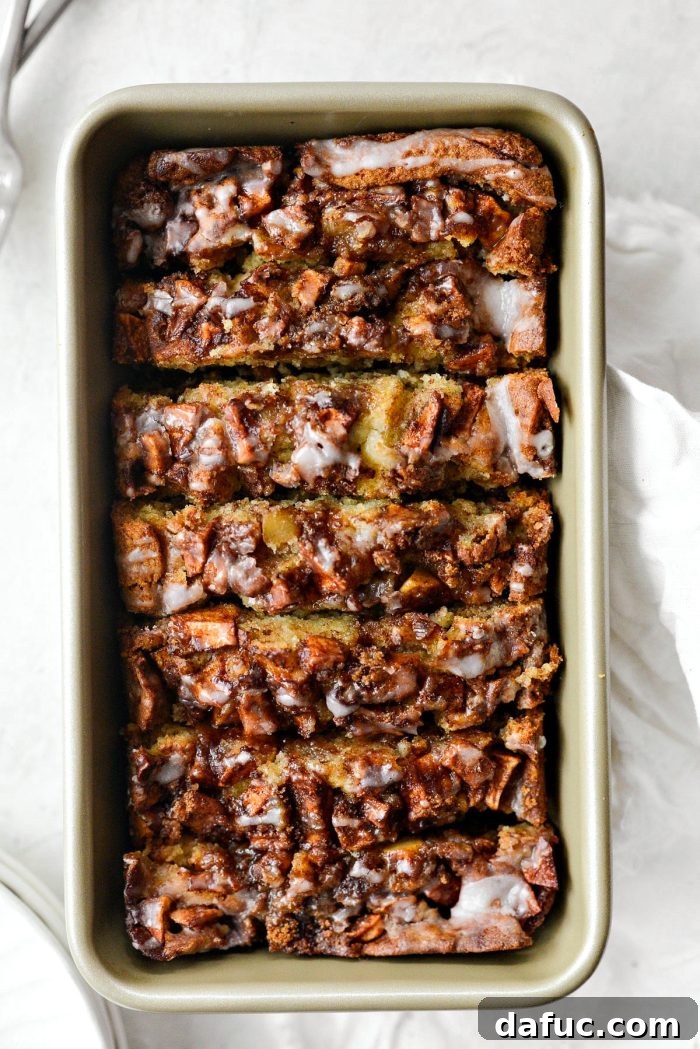 Cinnamon Apple Fritter Bread 24 Dutch Apple Fritter Bread sliced inside the loaf pan