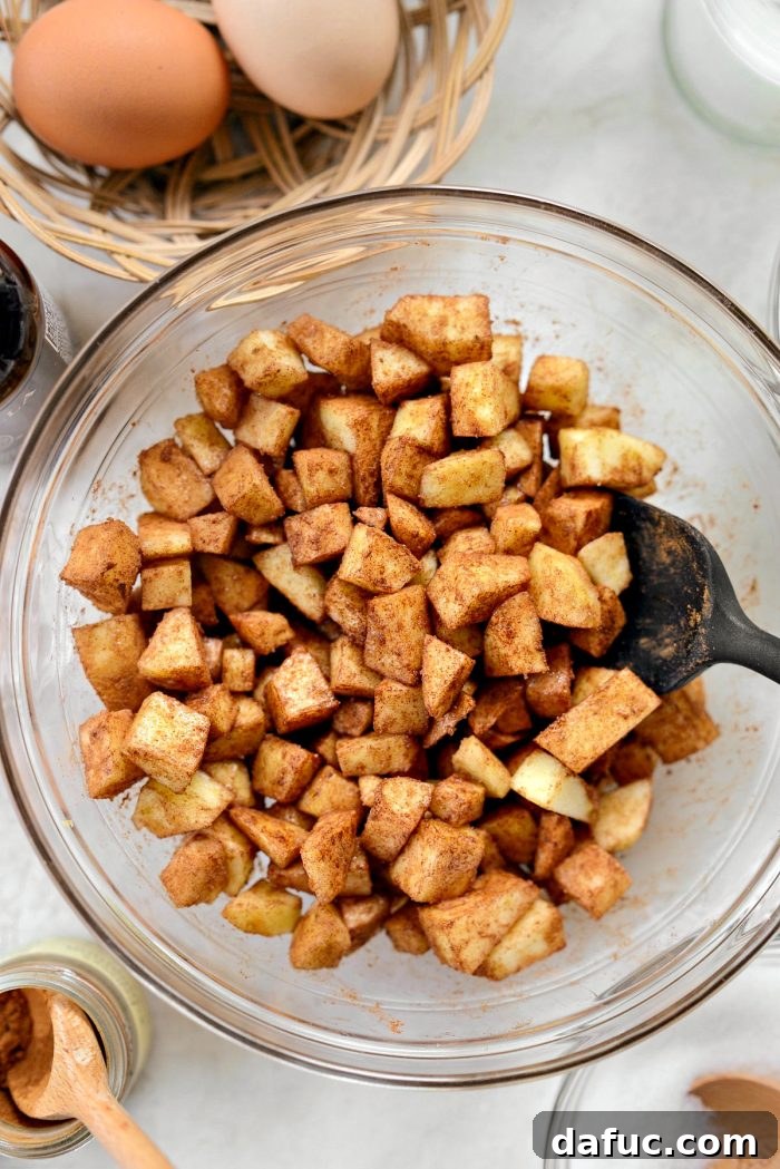 Cinnamon Apple Fritter Bread 7 Close-up of diced apples coated in cinnamon and sugar