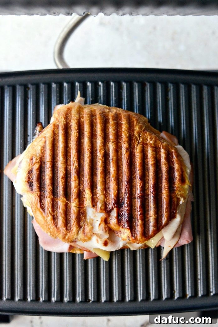 Monte Cristo Croissant Melt 15 Crispy top view of sandwich