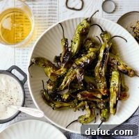 Sesame-Kissed Blistered Shishito Peppers with Zesty Lemon Garlic Aioli 19 Blistered Sesame Shishito Peppers with Lemon Garlic Aioli