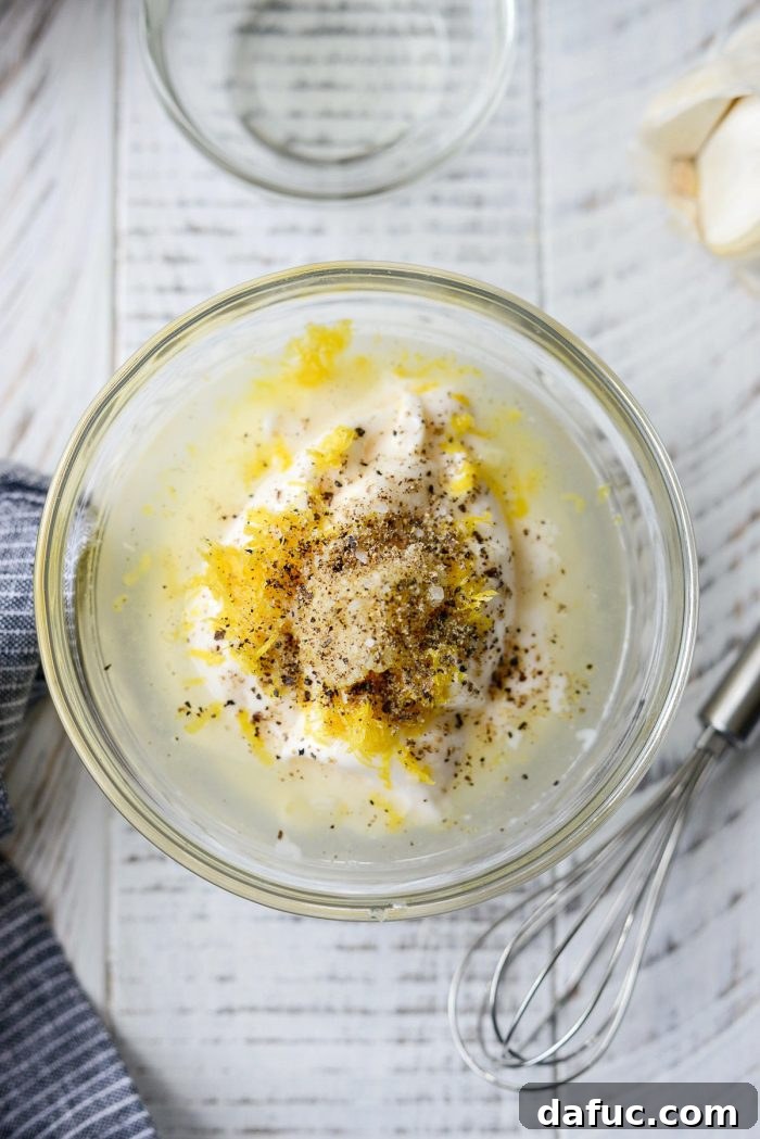 Sesame-Kissed Blistered Shishito Peppers with Zesty Lemon Garlic Aioli 5 Ingredients for the garlicky lemon aioli, including mayonnaise, lemon, garlic, salt, and pepper