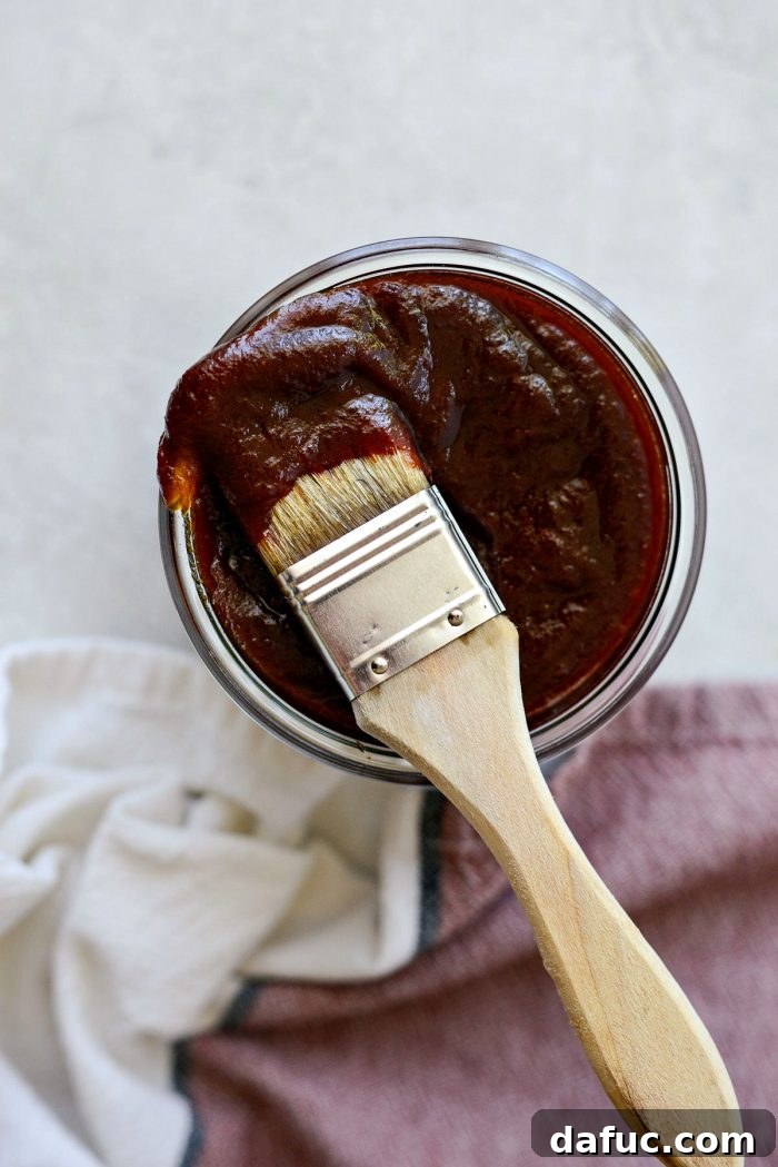 A final close-up shot of Coca-Cola Habanero BBQ Sauce, emphasizing its vibrant appeal and readiness for enjoyment.