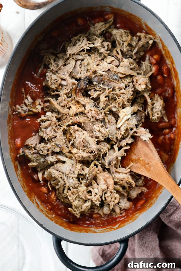 Fireside Smoky Pulled Pork Chili 10 Pulled smoked pork added to the simmering chili in the dutch oven
