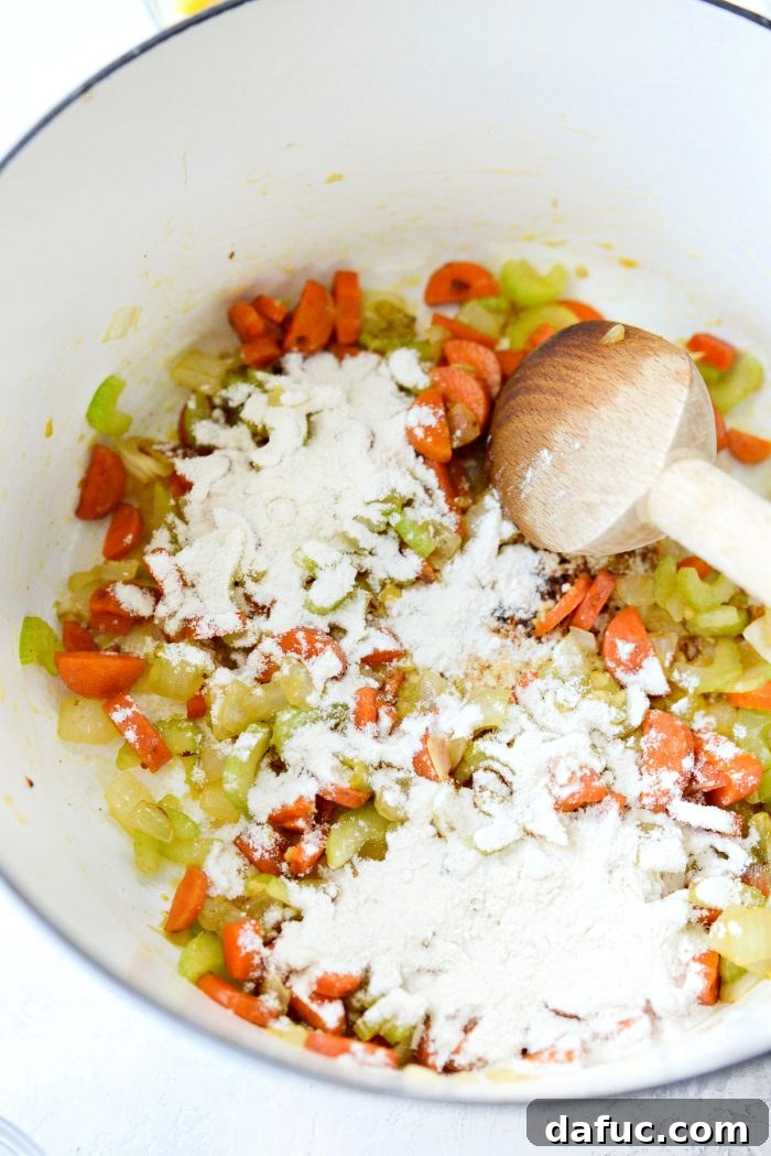 Coastal Catch Salmon Chowder 10 Two tablespoons of flour sprinkled evenly over the sautéed carrots, celery, onion, and garlic in a Dutch oven.