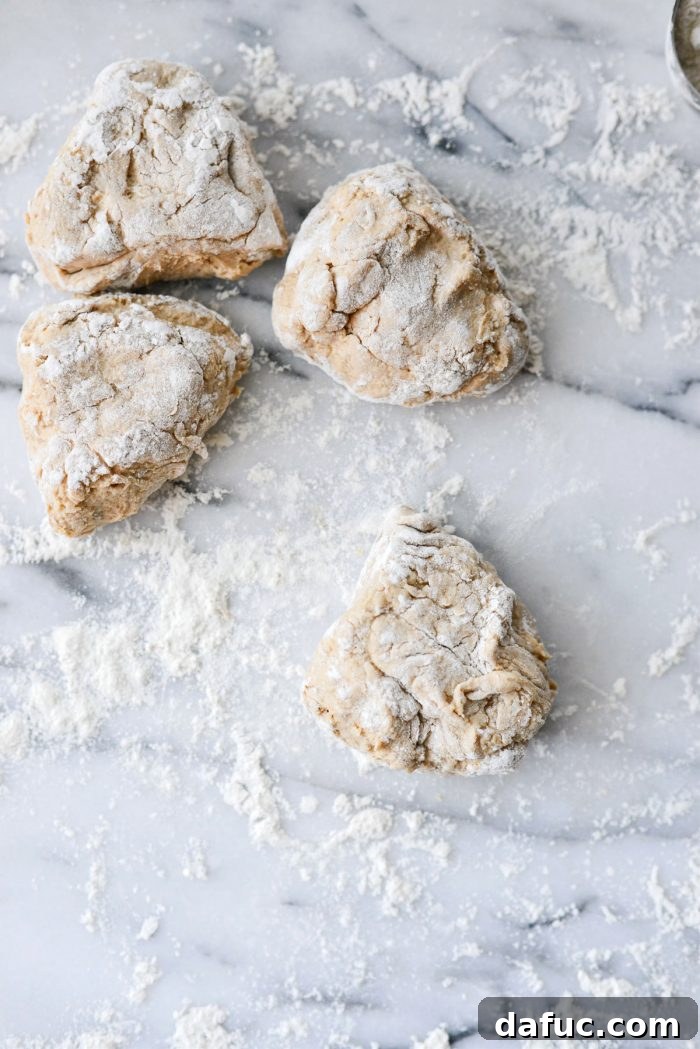 Delicious Air Fryer Pumpkin Spice Bagels 13 Each portion of bagel dough rolled in a little flour.