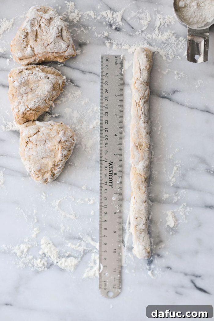 Delicious Air Fryer Pumpkin Spice Bagels 14 One piece of bagel dough shaped into a 9 to 10-inch rope.