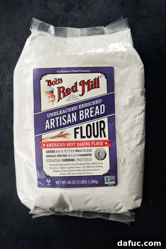 A bowl of sticky no-knead dough, ready for its overnight rise.