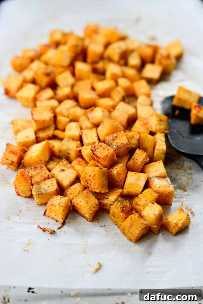diced pumpkin tossed with dried sage and paprika.