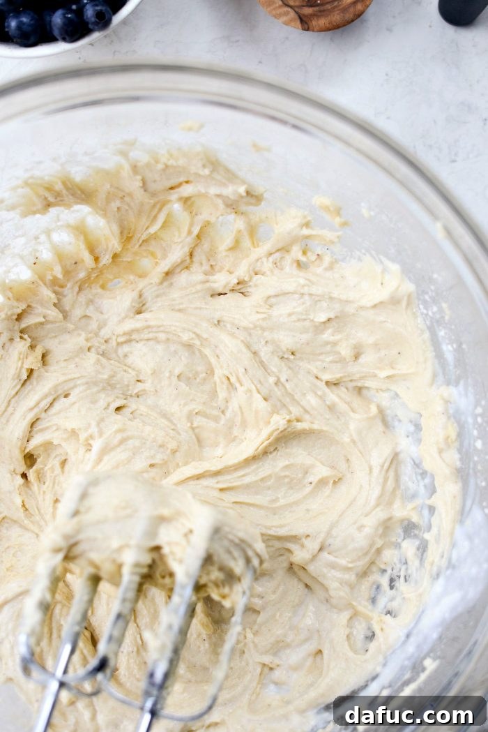 Streusel Berry Bliss 10 Combined smooth cake batter in a bowl