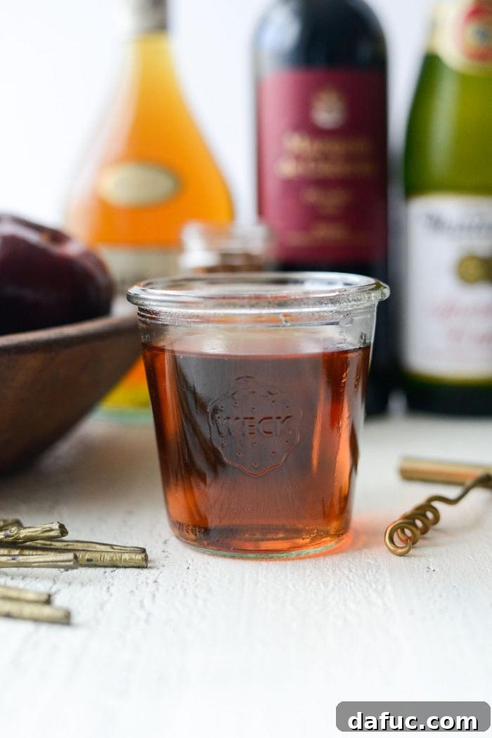 Ruby Fizz Sangria 5 Cinnamon sticks simmering to create homemade cinnamon simple syrup