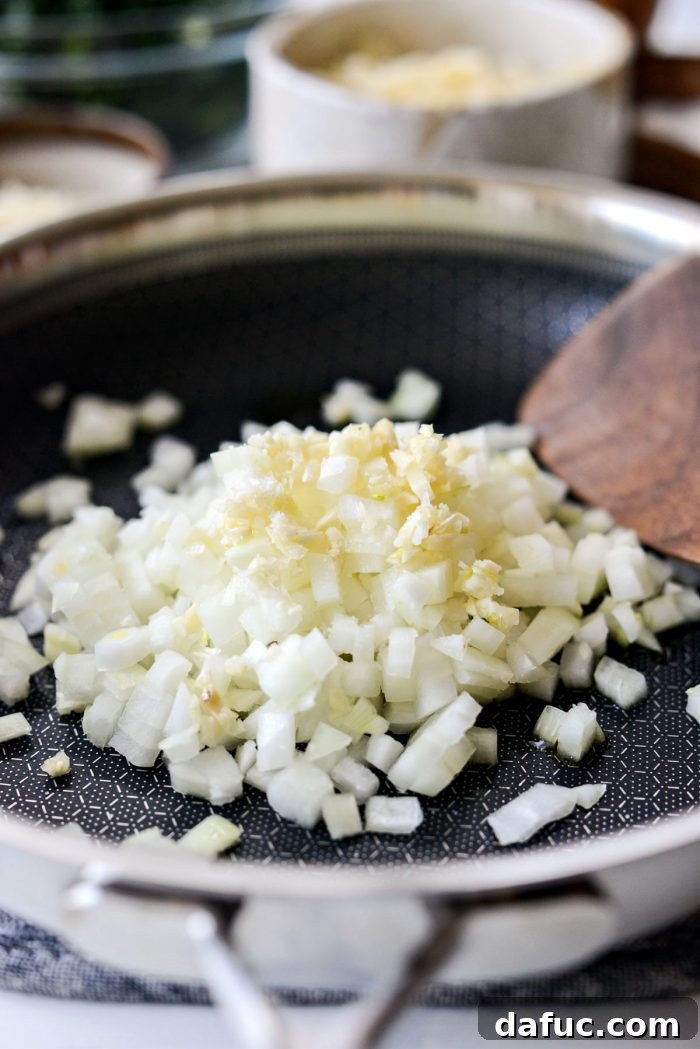 Garlic and onions gently sizzling in olive oil in a skillet, filling the kitchen with a wonderful aroma.