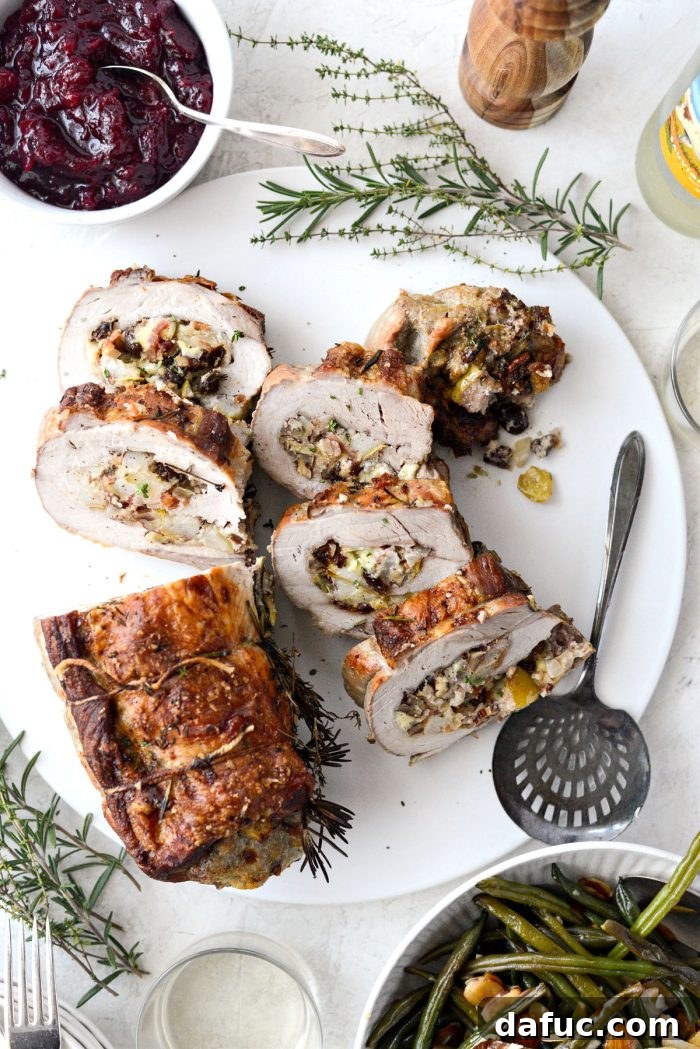 Sweet Pear, Savory Bacon, and Tangy Blue Cheese Stuffed Pork Loin 17 Sliced Bacon Pear and Blue Cheese Stuffed Pork Loin, showing the delicious filling