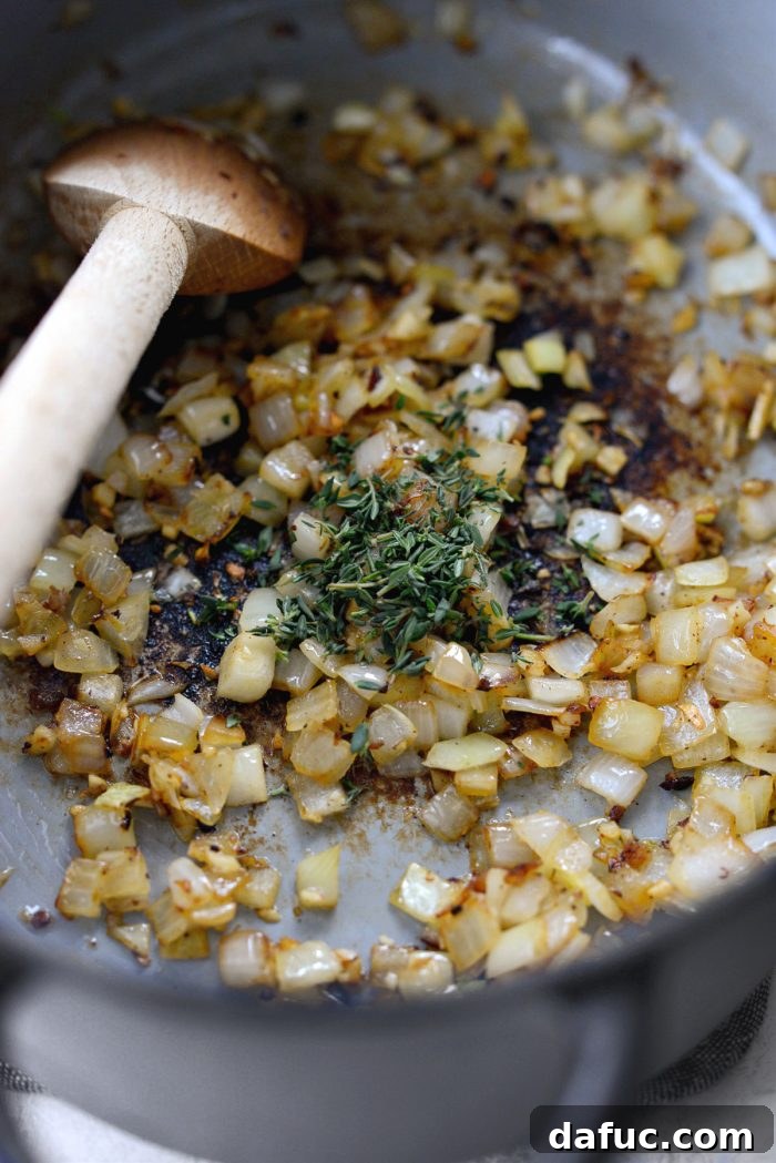 Sautéed onions, garlic, and thyme in the Dutch oven.