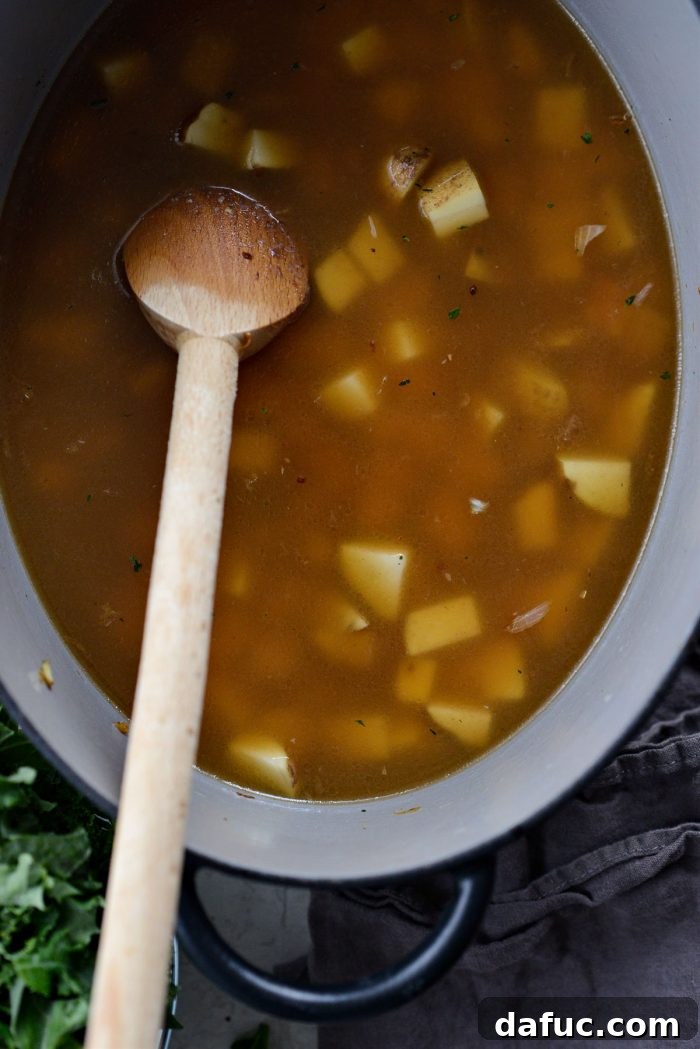 Simmered potatoes in the broth, now fork-tender.