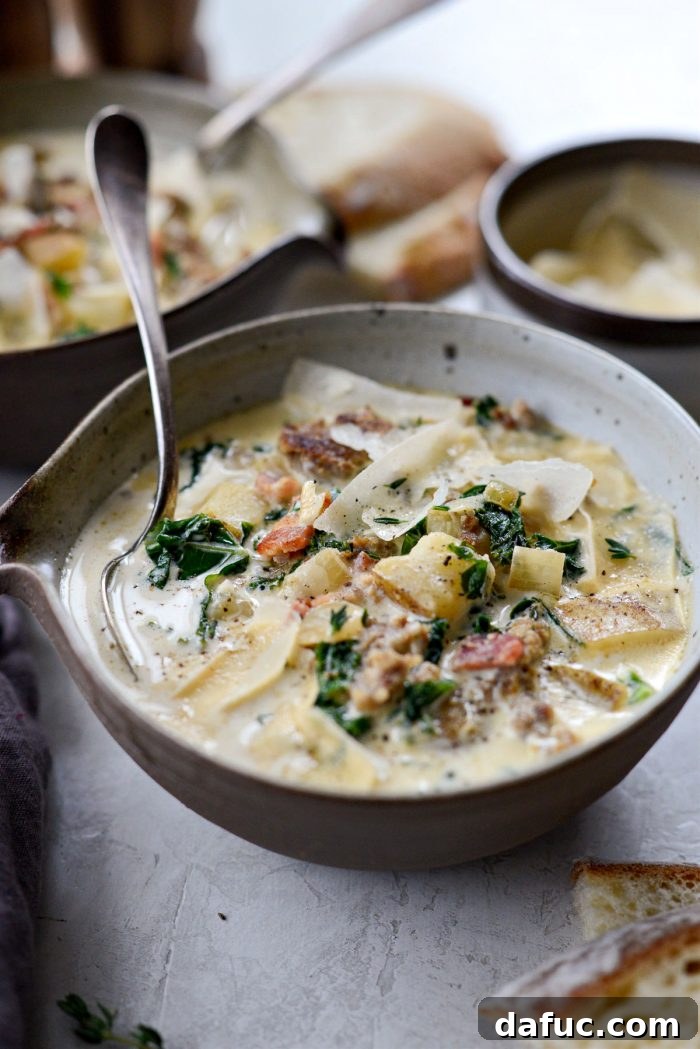 A close-up shot of a bowl of homemade Zuppa Toscana, showcasing its hearty ingredients.