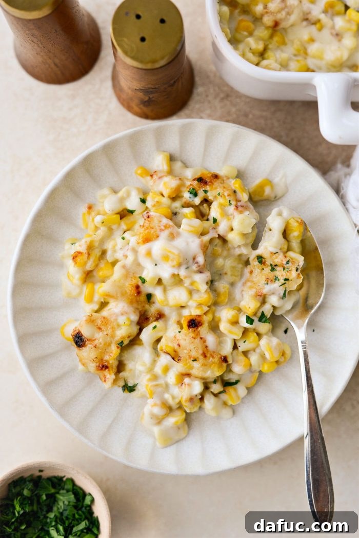 Golden Garlic Parmesan Corn Gratin 22 A close-up of a serving of Parmesan Garlic Corn Au Gratin