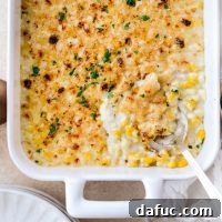 Golden Garlic Parmesan Corn Gratin 23 Parmesan Garlic Corn Au Gratin in a baking dish