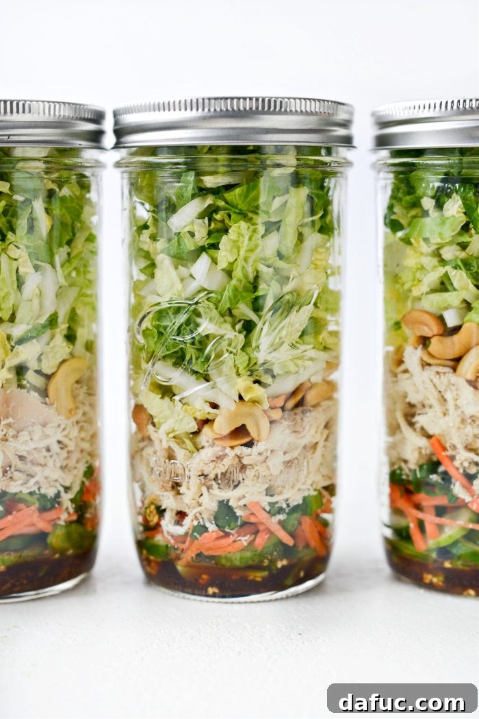 Delicious and healthy Asian Cashew Chicken Mason Jar Salad, perfect for meal prep.