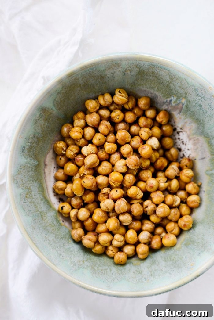 Perfectly Crisp Air-Fried Chickpeas 12 Crispy air fryer chickpeas as a topping for a fresh chicken Caesar salad