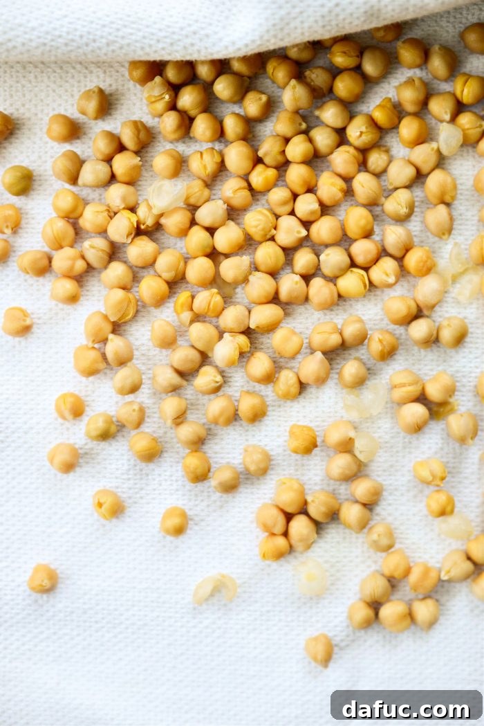 Perfectly Crisp Air-Fried Chickpeas 7 Discarding loose chickpea skins after patting them dry