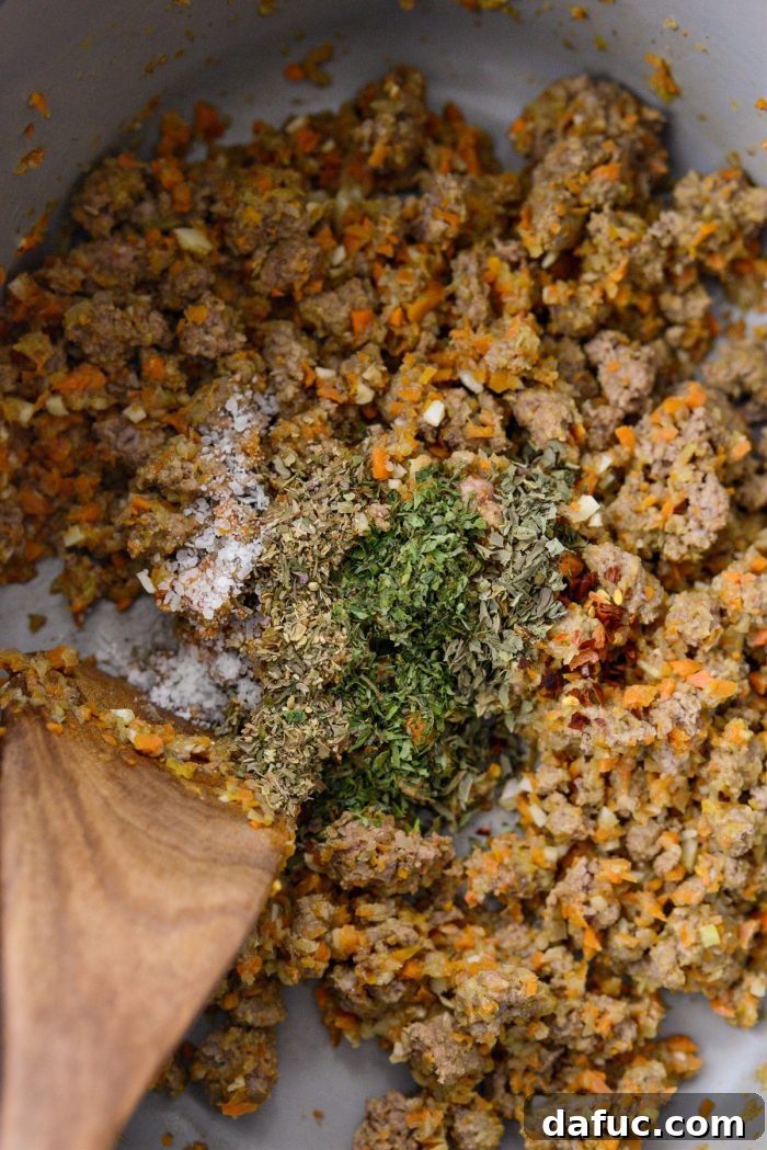 Slow Roasted Spaghetti Sauce 11 Dried herbs and spices added to the cooked ground beef and vegetable mixture.