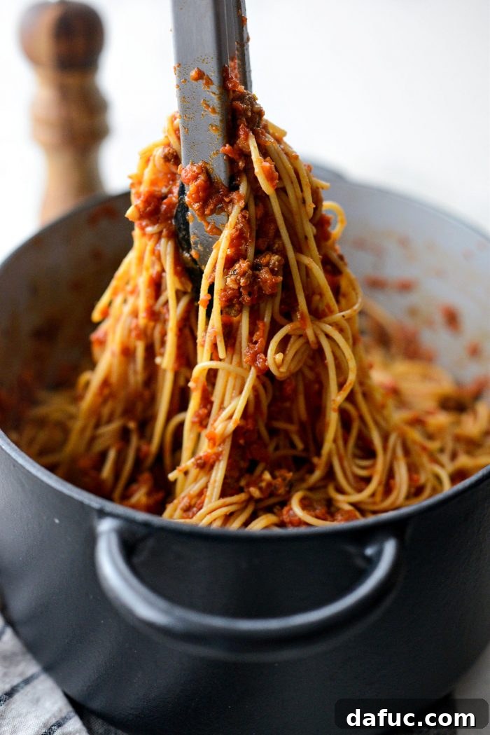 Slow Roasted Spaghetti Sauce 18 Close-up of the delicious, saucy spaghetti mixed with slow baked meat sauce.
