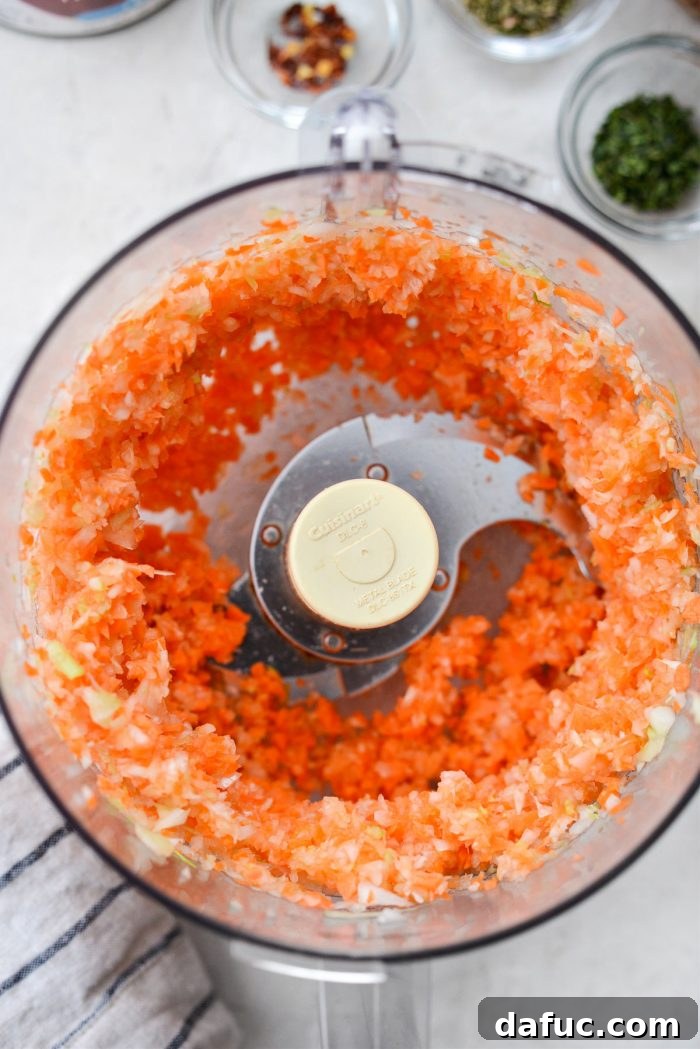 Slow Roasted Spaghetti Sauce 7 Finely minced carrots, onions, and celery in a food processor bowl.