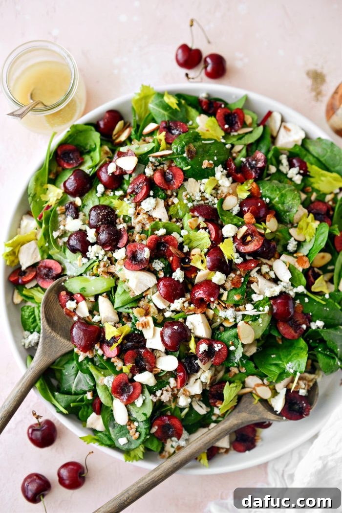 Close-up of Cherry Winter Wheat Berry Salad in a serving bowl, showcasing the vibrant ingredients and textures